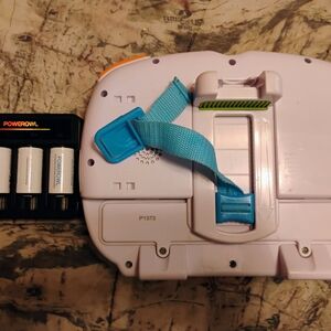 White and Blue Electronic Device with Powerowl Batteries Plays Music With Lights